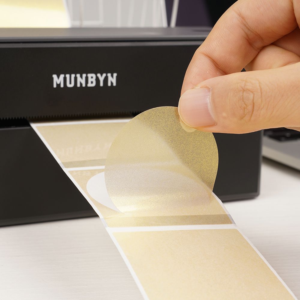 Gold glitter labels printed on MUNBYN CA label printer paper, showcasing 2-inch decorative adhesive labels.