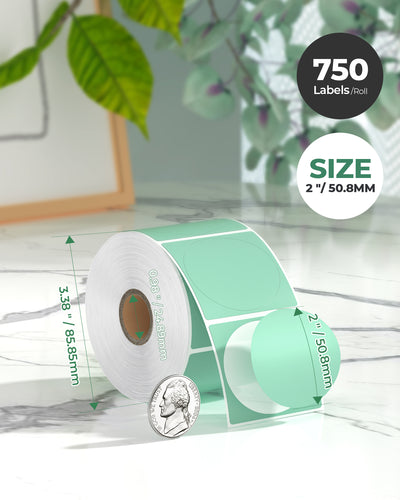 Close-up of 2-inch circular labels printed on MUNBYN CA label printer paper with a green design.