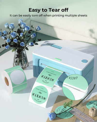Green 2-inch circle labels printed on MUNBYN CA label printer paper, showing vibrant circular labels ready for use.