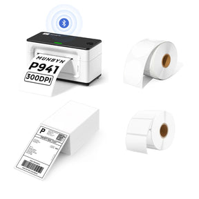 MUNBYN P941B Bluetooth Thermal Label Printer Kit includes a Bluetooth label printer, two rolls of blank labels and a stack of shipping labels.