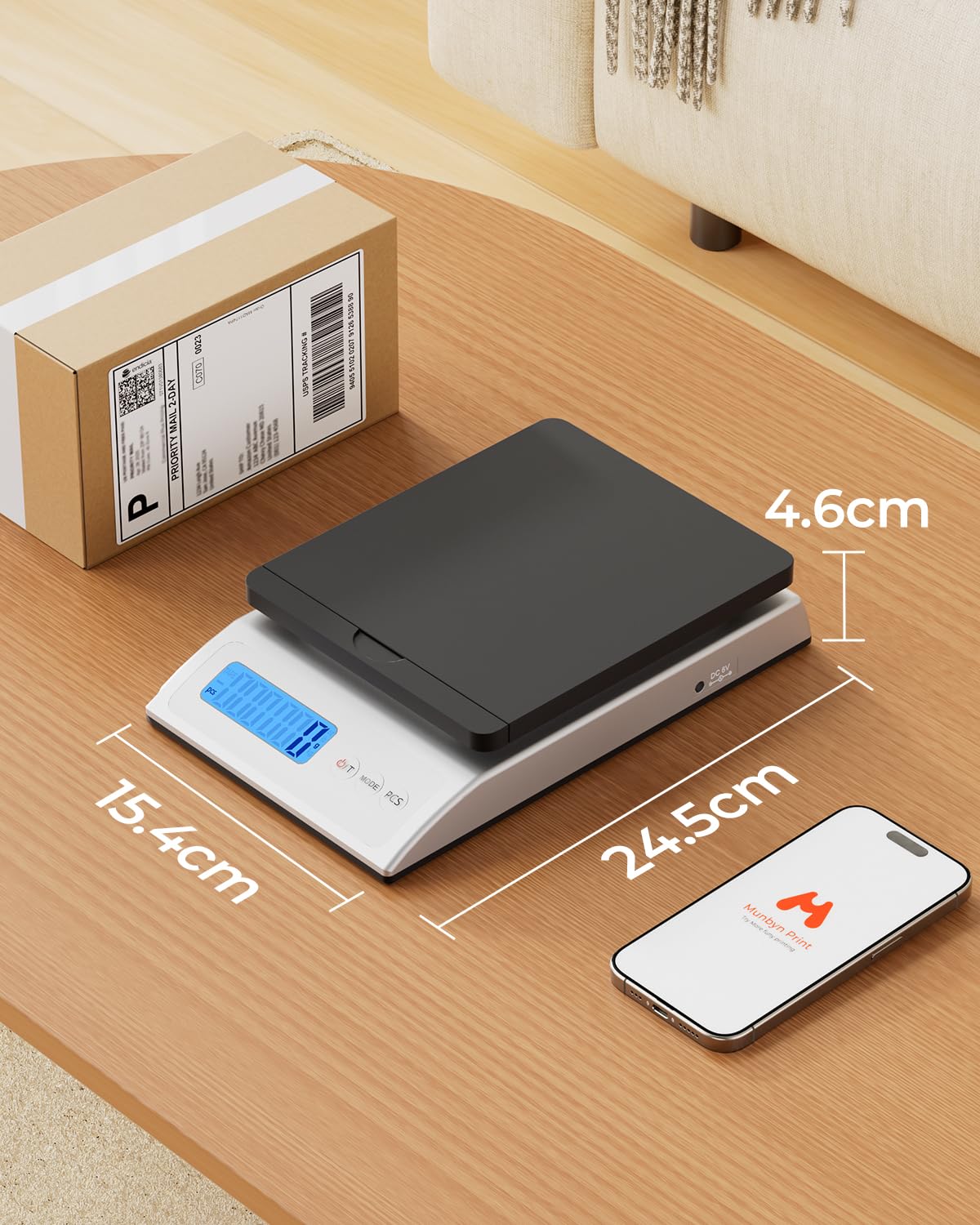 Black MUNBYN CA IPS01 Postal Scale used with label printer accessories, showing digital display and compact design.